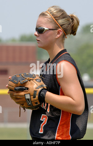 Teenage female Major league Softball action Stock Photo