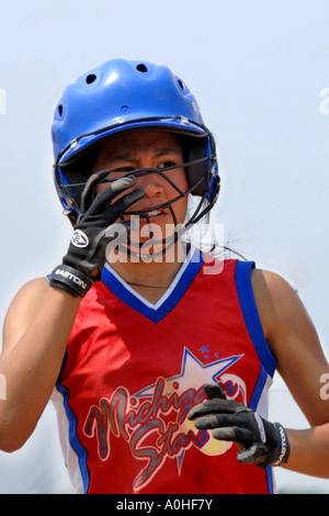 Teenage female Major league Softball action Stock Photo