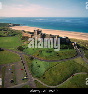Aerial view of Bamburgh Castle towards Lindisfarne UK Stock Photo