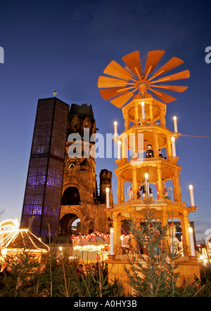 Berlin christmas market Kaiser Wilhelm memory church christmas lights at dusk people Stock Photo