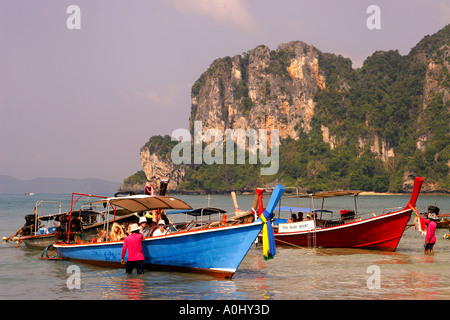 THA Thailand Krabi Railay beach long tail boats tourists Stock Photo