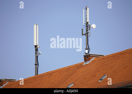 Mobile phone antennas on roof Stock Photo