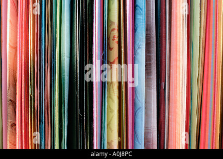 Hanging coloured pleated fabric Stock Photo