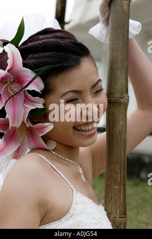 A young Vietnamese bride poses for her wedding picture in Hanoi Vietnam Stock Photo