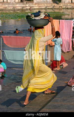 Rajasthani Woman Bathing At The Ghat On Lake Pichola Udaipur