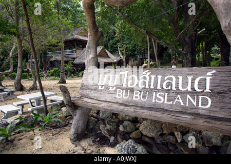 A wooden sign on the island of Bu Bu in Southern Thailand This is one of the smallest islands and has no inhabitants just holiday bungalows Stock Photo