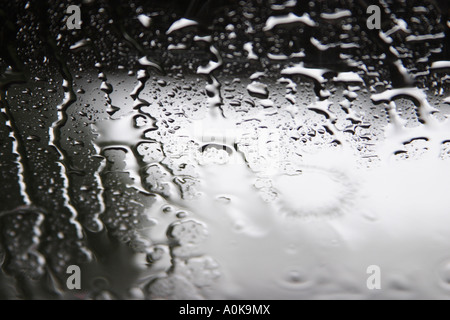 raindrops on window pane Stock Photo