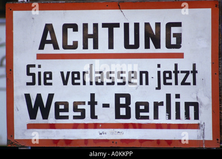 Warning sign in front of Berlin Wall in front of Brandenberg Gate in West Germany in 1985 Stock Photo