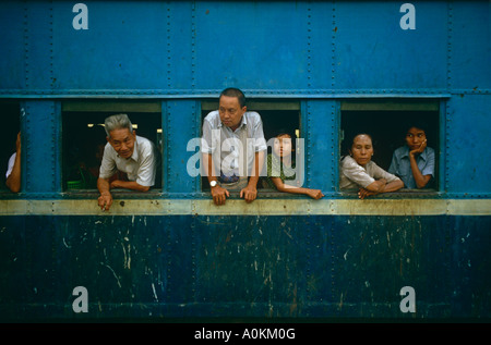 passengers on a train at the station in Rangoon Yangon Burma Myanamar Stock Photo