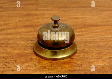 Old tarnished worn reception bell Stock Photo