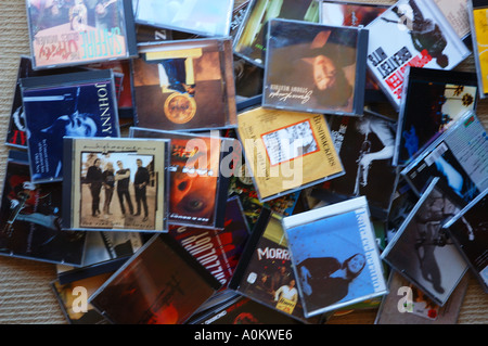 jumble of CD covers on floor dsca 0588 Stock Photo