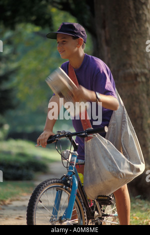 newspaper delivery boy  USA PA Pennsylvania newsboy carrier deliver delivery Stock Photo