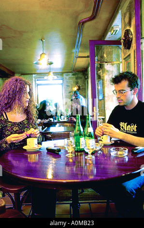 Paris France, Young Adult Couple Sharing Drinks in Italian Restaurant "Gli Angeli" in Le Marais  Coffee Mineral Water Stock Photo
