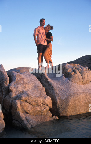 Australia Queensland Lizard Is couple posing on rocks Stock Photo