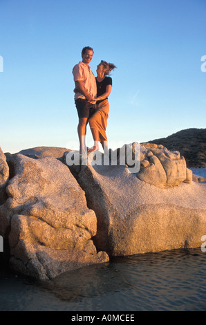 Australia Queensland Lizard Is couple posing on rocks Stock Photo