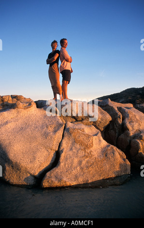 Australia Queensland Lizard Is couple posing on rocks Stock Photo