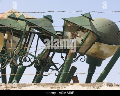 Broken street lamps in council yard Stock Photo