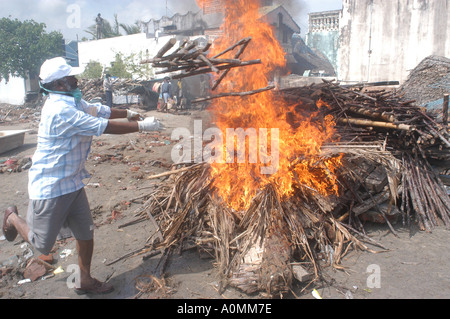 burning funeral pyre after Tsunami earthquake Nagapattinum Velankanni Tamil Nadu India Stock Photo
