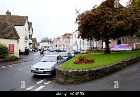 Shops and car parking in village centre of Chew Magna near Bristol England UK Stock Photo