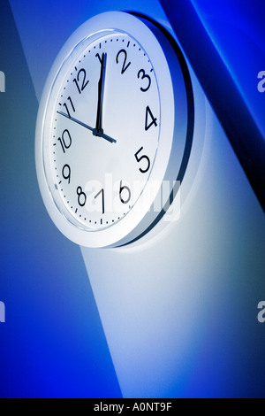 Clock face close up abstract view on office wall Stock Photo