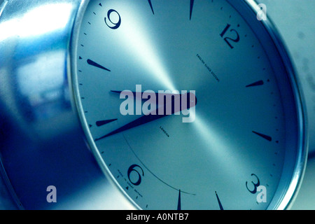 Clock face close up abstract view on office wall Stock Photo