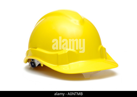 Yellow protective hard hat or helmet on white background Stock Photo