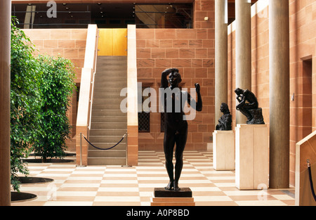 The Burrell Collection art exhibition gallery, Glasgow, Scotland. Auguste Rodin sculptures The Age of Bronze and The Thinker Stock Photo