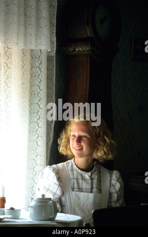 At the Skansen living museum,in Stockholm,Sweden Traditional costume is worn and lifestyle followed Stock Photo