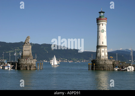Harbour entrance of Lindau with the famous lighthouse and lion sculpture on Lake Constance in Germany Stock Photo