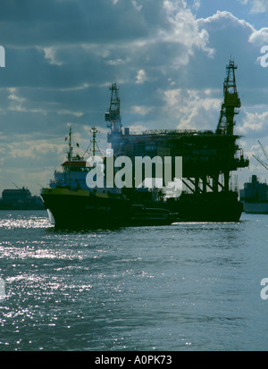 Gas platform floatout; modules on a barge being towed down River Tyne, Tyneside, Tyne and Wear, England, UK. Stock Photo