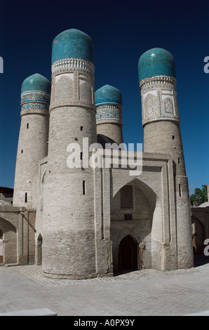 Towers of the Char Minar medressa gatehouse built in 1807 Bukhara Uzbekistan Central Asia Asia Stock Photo