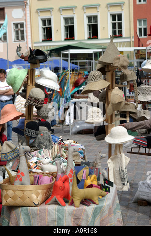 Market stall in the square of the old town in Tallinn Estonia with the town hall in the background Stock Photo