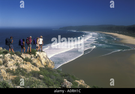 White hikers or trekkers on Nature s Valley Otter Trail on the Garden Route Cape Province South Africa Stock Photo