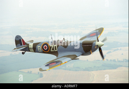 Spitfire Mk IXB in flight piloted by Ray Hanna Stock Photo