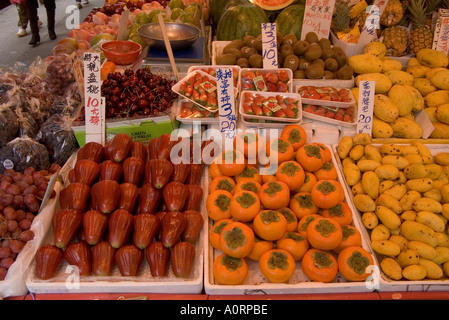 dh  TAIPO HONG KONG Fruit market stall display shop calligraphy price tags farm produce asia Stock Photo