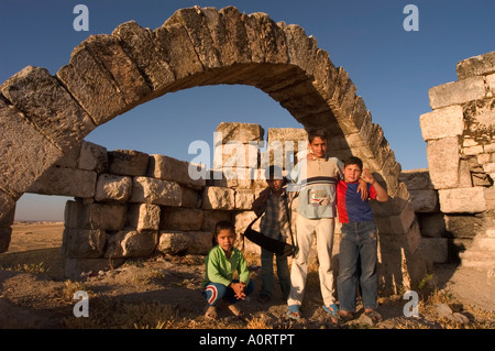 Children at Qala at al Mudiq medieval castle Apamea Qalat at al Mudiq Syria Middle East Stock Photo