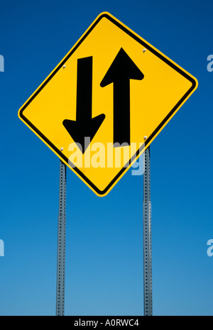 Directional signpost pointing north up the A33 to the north of Stock ...