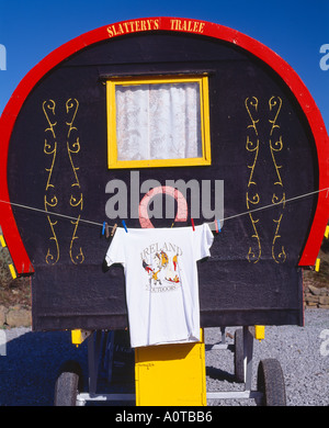 old style horse drawn gypsy caravan on an irish rural road, Stock Photo