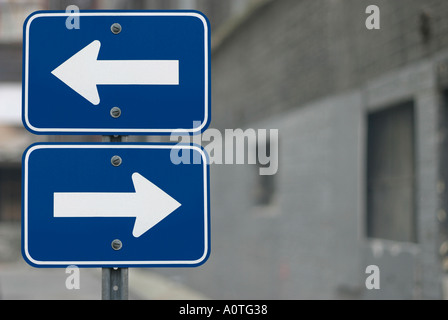 Two part sign with arrows pointing left and right in opposite ...