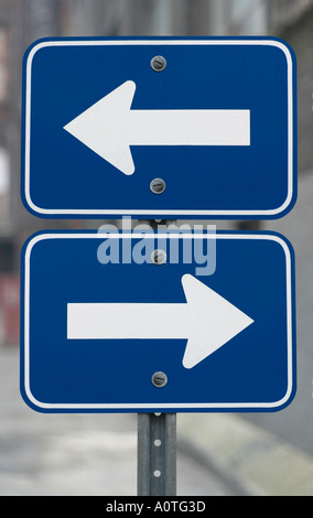 Two part sign with arrows pointing left and right in opposite ...