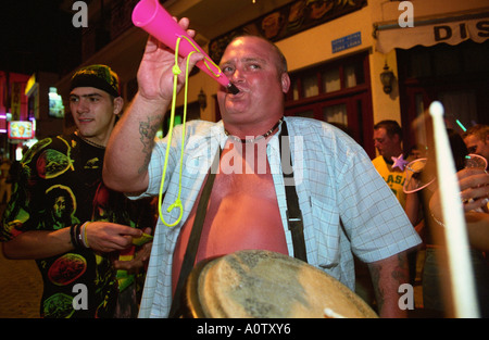 Ayia Napa, Cyprus. English tourist outside a bar on the main square Seferis Platea. Stock Photo