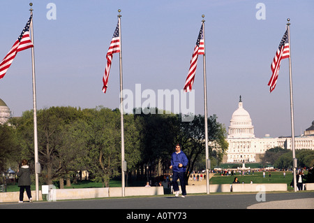 A jogger on the Mall with the US Capitol building in the background Stock Photo