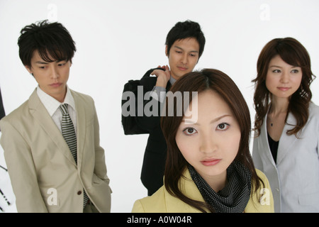 High angle view of two businessmen and two businesswomen Stock Photo