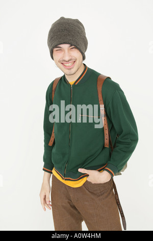 Portrait of a young man looking cheerful Stock Photo