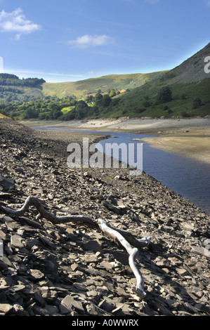 Extreme low water Garreg ddu reservoir from which Birmingham gets its drinking water in the Elan Valley Mid Wales UK Stock Photo