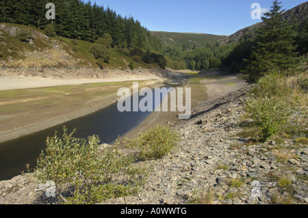 Extreme low water Garreg ddu reservoir from which Birmingham gets its drinking water in the Elan Valley Mid Wales UK Stock Photo