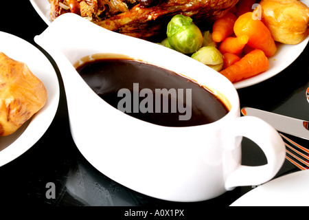 Authentic Traditional Roast Turkey Christmas Dinner With A Gravy Boat And No People Stock Photo