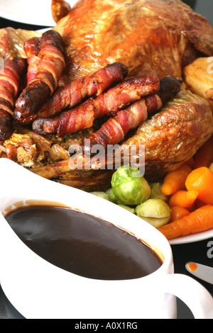 Authentic Traditional Roast Turkey Christmas Dinner With A Gravy Boat And No People Stock Photo