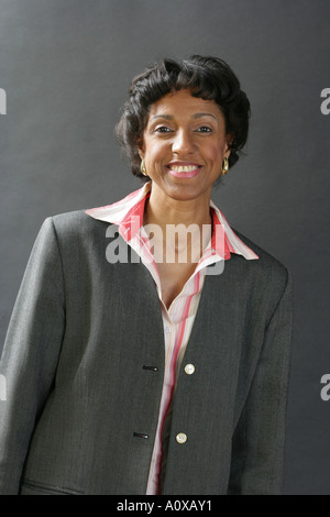 Healthy woman smiles for the camera. Stock Photo