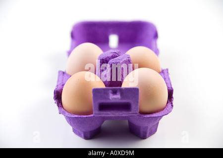 Four eggs in a carton Stock Photo